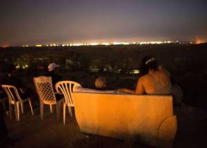 Citizens of Southern Israel gather to watch and enjoy the Gaza slaughter