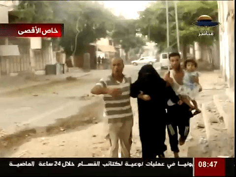 Gazan Civilians Flee massacre in Shujiya, August 2014. 
