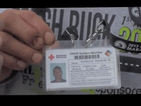 It is a custom for spectators at US sporting events to carry their Red Cross card around their neck to the event, right?