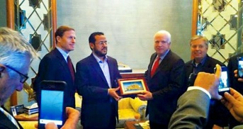 You haven't made it big as a leader of Jihad until you meet with the American Emir-Senator John McCain greets Belhaj following the ouster of Gaddafi.