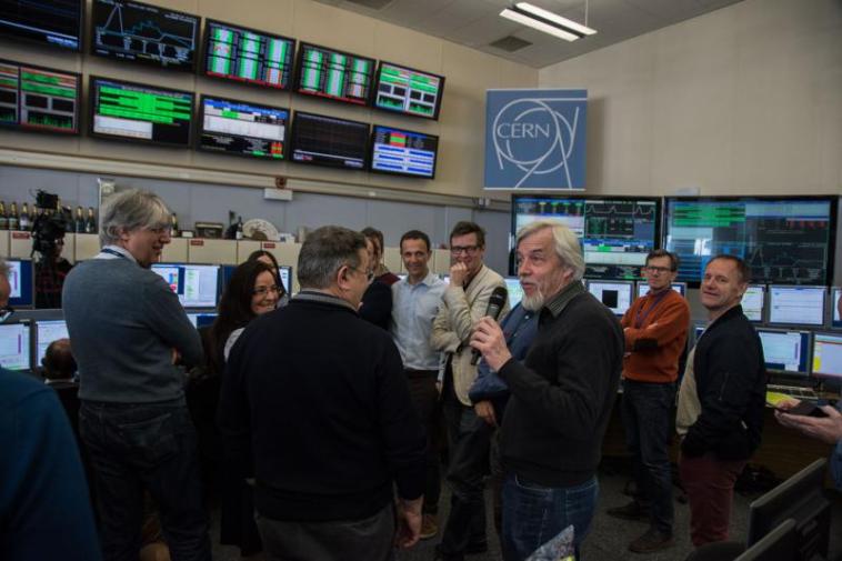 Scientists and technicians in the LHC operations room.