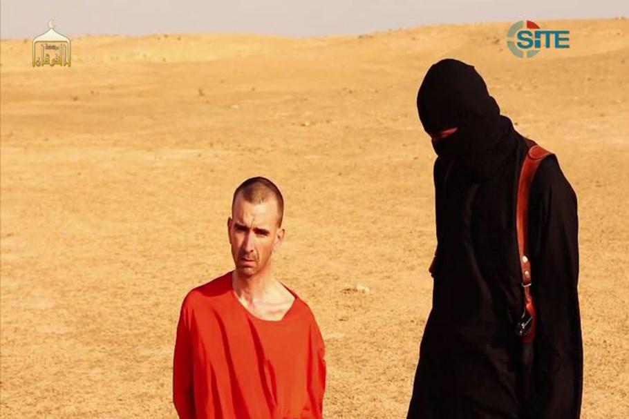 John with Peter Kassig prior to fake execution. 