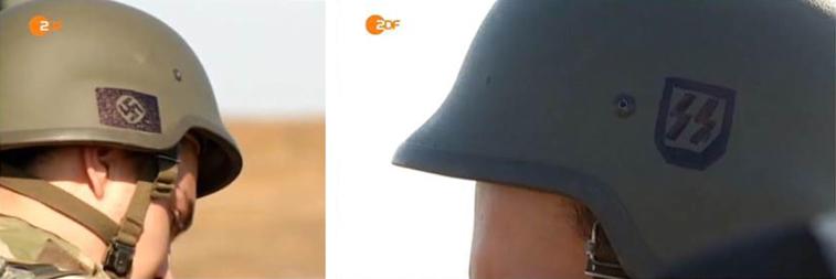 Swastikas on the helmets of pro Kiev junta forces allegedly. 