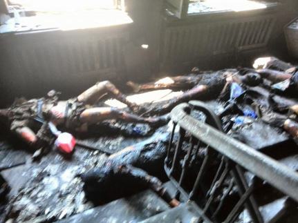 People died in the fires, many others emerged from the fires only to be murdered by thugs in full view of the police. 