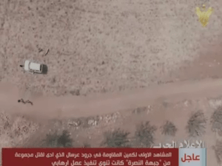 al Nusra fighters leave their vehicle in an isolated area of the Qalamoun border region.