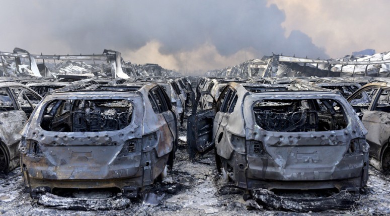 The cars in Tianjin show the signs of having been struck by a Thermal wave associated with a Nuclear blast, the premature corrosion giving a rusted appearance is one strong tell-tale sign.