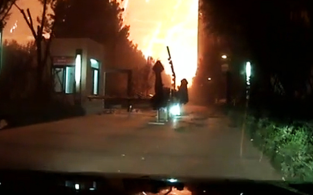 Dashcam footage of the prelude to the massive blast in Tianjin, China August 12th, 2015.