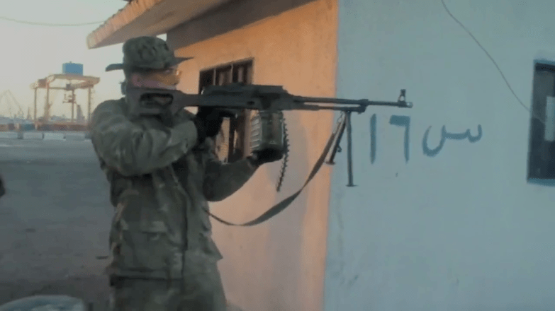 The Arabic letering on the building and the Port visible in the background indicate the footage is authentic and was shot in Tartarus.
