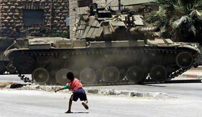 Classic image of the conflict in Palestine but a sonte throwing child will never defeat a tank in the field of battle.