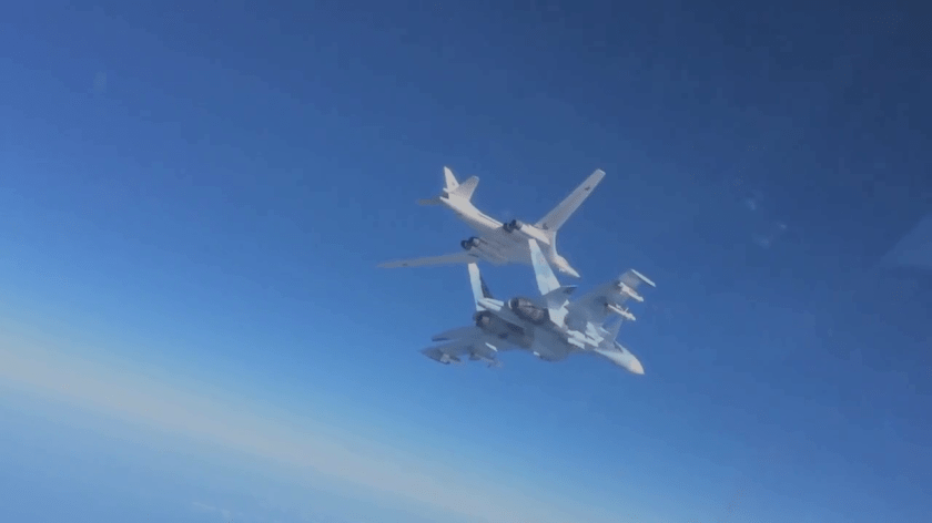 Su30 fighter escorts TU 160long range bomber. 