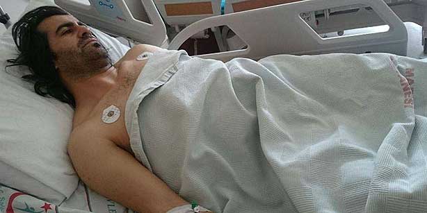 Refik Tekin recovering from the gunshot wound to his leg and awaiting arrest. 
