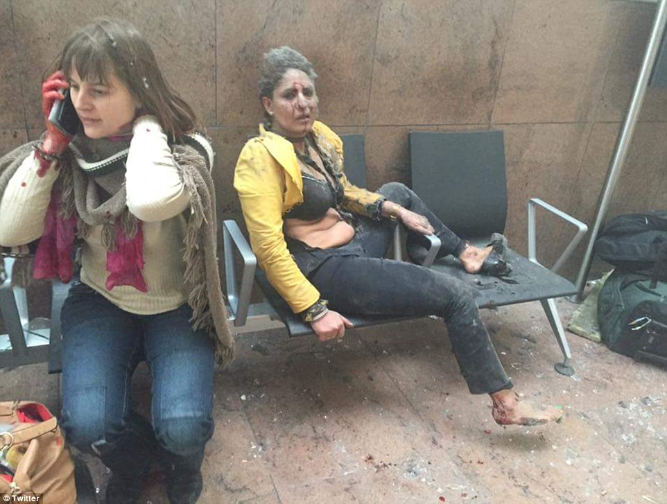 Survivors of the airport attack in the aftermath. 