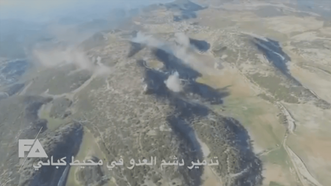 Syrian Amry rockets impact on a Latakia mountain viewed from a surveillance drone.