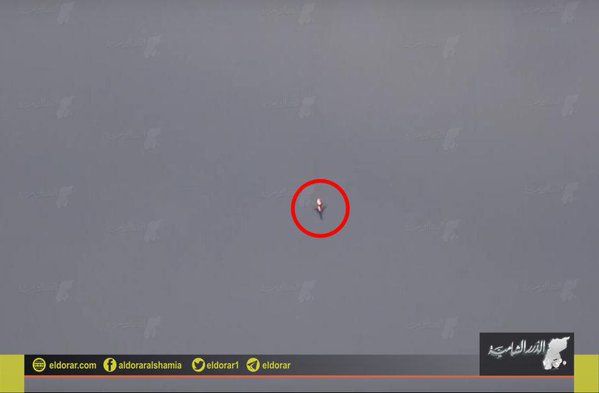 The Syrian Air force SU22 burns as it falls to the earth.