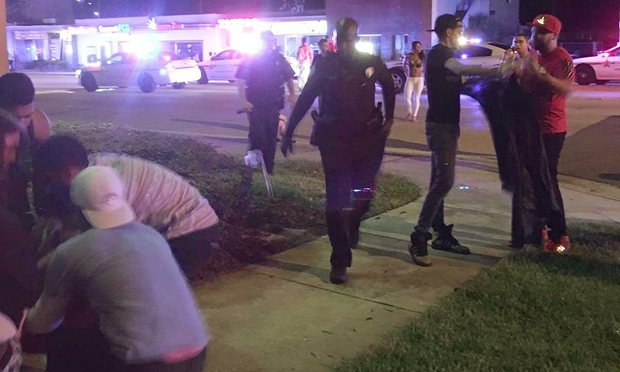 Police and bystanders in Orlando, June 12th, 2016. 