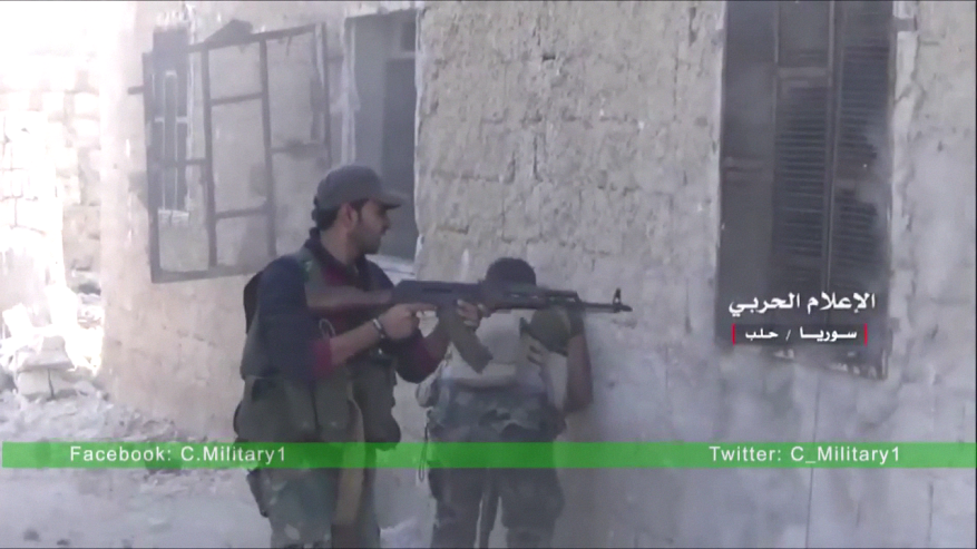 SAA/Hezbollah soldiers engage insurgents at close quarters in Western Aleppo, November 2016. 
