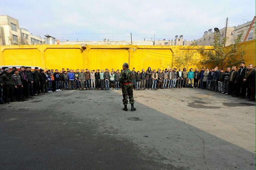 Mass surrender:defeated insurgents lay down their arms en masse in east Aleppo December 12th, 2016.
