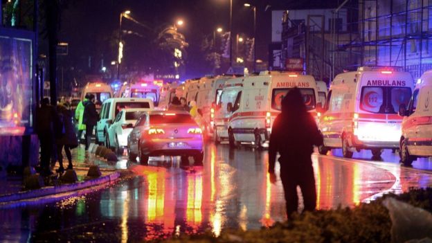 Ambulances congregate in the streets of Ozakay following the Reina nightclub massacre.