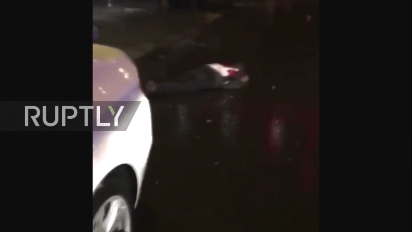 A dead body in the street outside the Reina nughtclub
